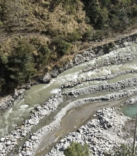 Braided riverbed reshaped below a construction site